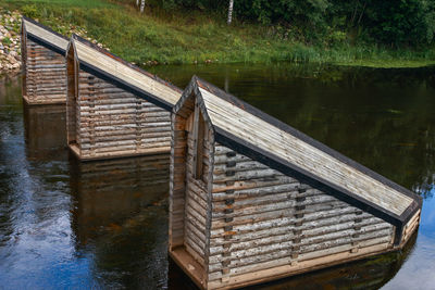 Wooden bridge over lake in forest