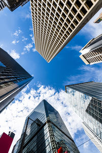 Low angle view of modern buildings against sky