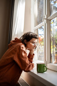 Young woman using mobile phone