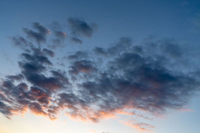 Low angle view of dramatic sky during sunset