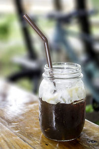 Close-up of drink in mason jar on table