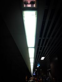 People at railroad station in city