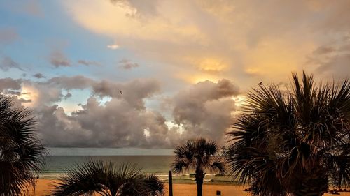 Scenic view of sea against sky at sunset