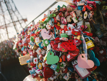 Close-up of padlocks hanging on railing