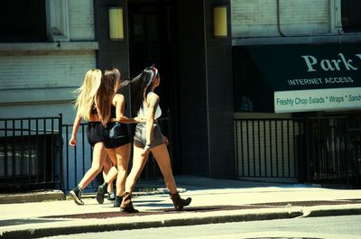 Woman walking on road