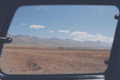 Scenic view of sky seen through car windshield