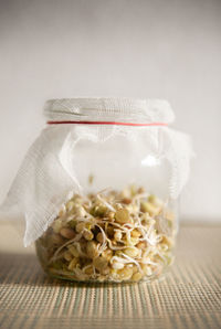 Close-up of food in jar on table