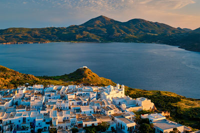 View of plaka village on milos island on sunset in greece