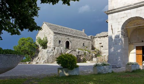 View of the ancient citadel of repen, on the karst plateau, italy