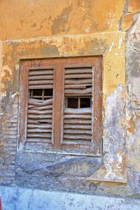 Close-up of window on brick wall