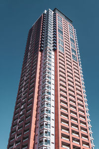 Low angle view of modern building against sky