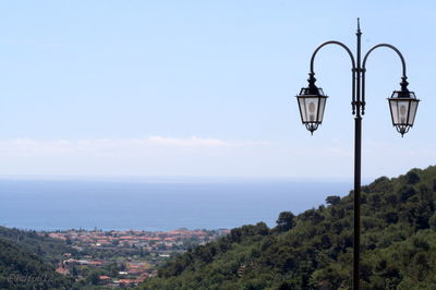 Scenic view of sea against blue sky