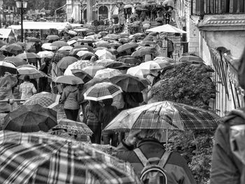 Group of people on wet street in rainy season