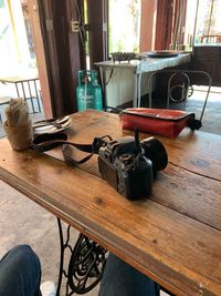 High angle view of camera on table at home