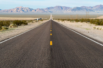 Road leading towards mountains