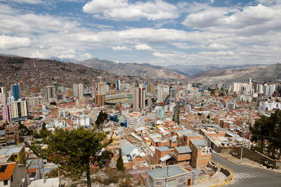 Aerial view of town against sky