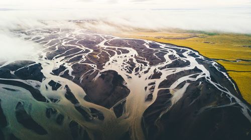 High angle view of land against sky