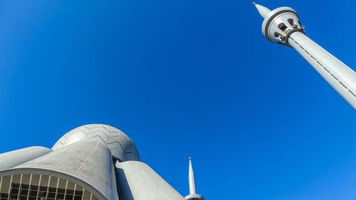 Low angle view of building against blue sky