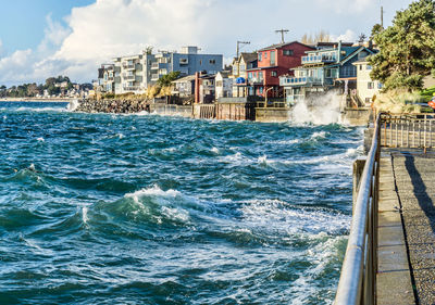 West seattle homes face the puget sound on a windy day.