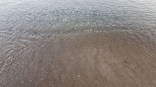 High angle view of sand on beach