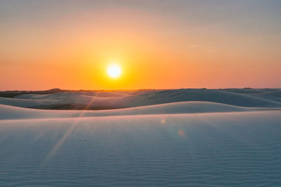 Scenic view of landscape against sky during sunset