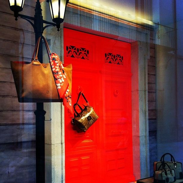 indoors, red, door, illuminated, built structure, wall - building feature, architecture, lighting equipment, hanging, house, no people, metal, closed, wood - material, absence, abandoned, wall, old, day, chair