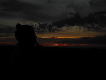 Silhouette of man at sunset