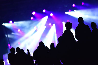 Silhouette people enjoying at music concert