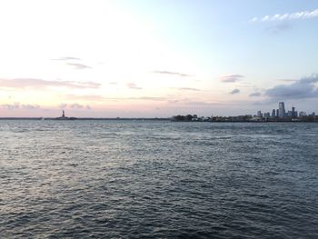 Scenic view of sea against sky at sunset