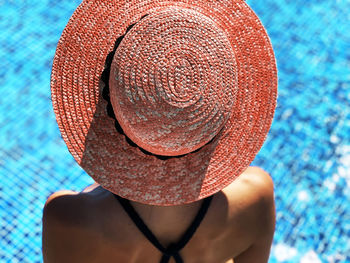 Low angle view of man wearing hat