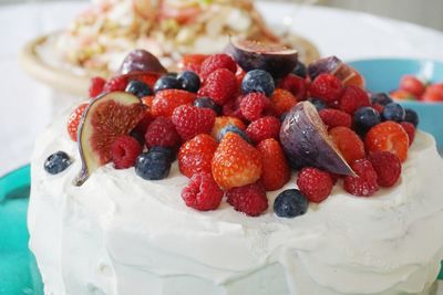 Close-up of fruitcake in plate on table