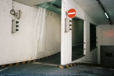 Road sign on wall