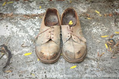 High angle view of shoes on street