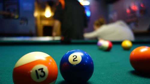 Close-up of balls on pool table