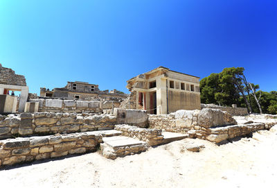 View of old ruin building against blue sky