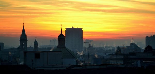 View of cityscape at sunset