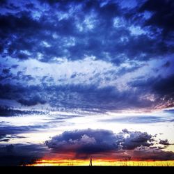 Scenic view of dramatic sky during sunset