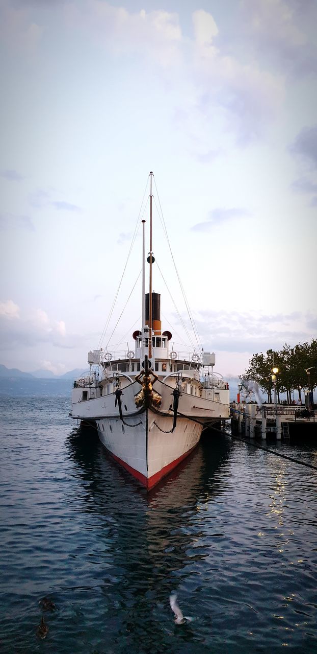 water, nautical vessel, transportation, mode of transportation, sky, sea, cloud, vehicle, nature, boat, sailboat, ship, travel, reflection, sailing, harbor, architecture, travel destinations, outdoors, sailing ship, no people, mast, day, pole, bay, ocean, watercraft, beauty in nature, tall ship, holiday, vacation, tourism, coast, trip, waterfront, scenics - nature, craft, tranquility, moored, blue