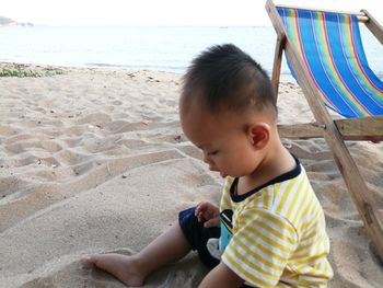 Boy on shore at beach