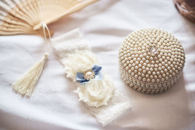 High angle view of white roses on table