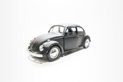 Close-up of toy car against white background