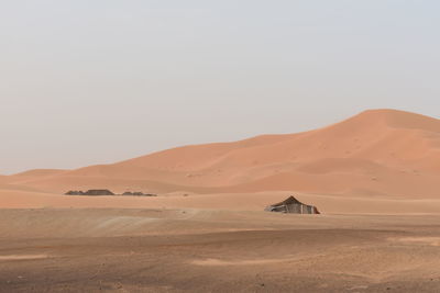 Camping in a tent in the sahara desert in morocco.