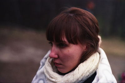 Close-up of thoughtful woman looking away