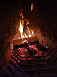 Bonfire on wooden wall