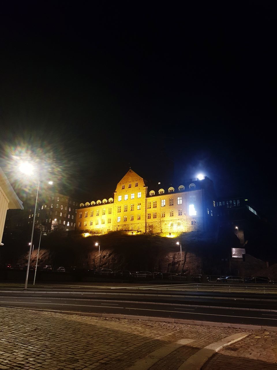 ILLUMINATED BUILDINGS AT NIGHT