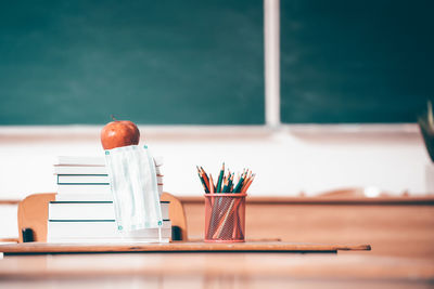 Close-up of pencil on table in restaurant