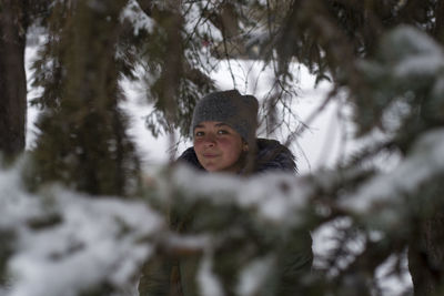 Portrait of smiling girl in snow