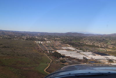 Aerial view of road against clear sky