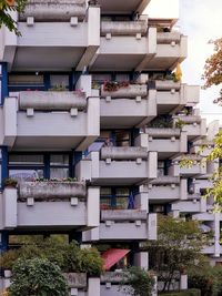 Low angle view of brutalist building with balconies