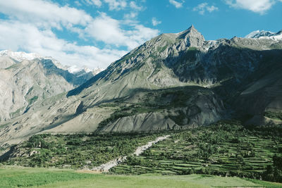 Scenic view of snowcapped mountains against sky